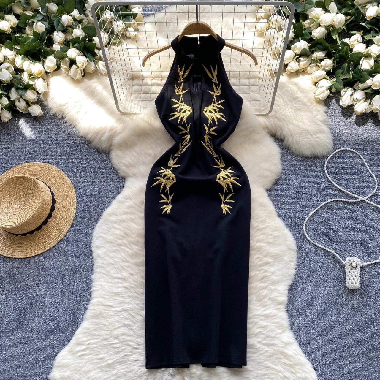 black with a touch of gold dress Dark Symphony Ember Gown– Teuta Matoshi main image 0