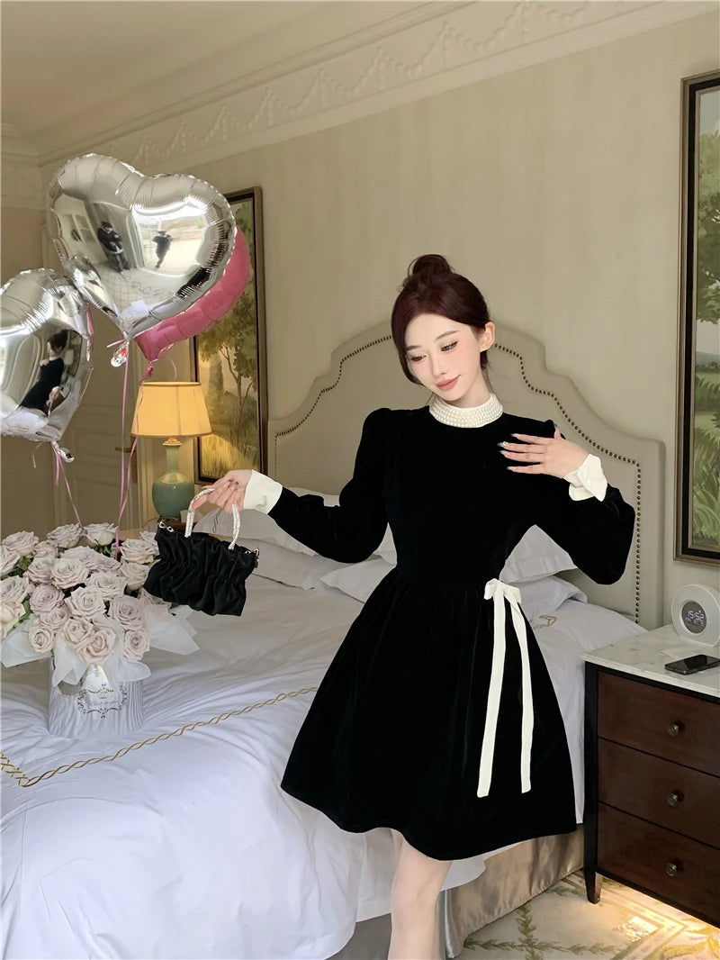 Black Velvet Dress With White Collar And Bow